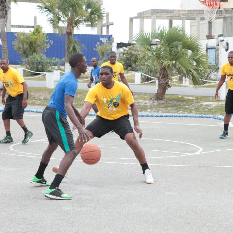 Marine Seaman Benoit Brown trying to defend Marine Seaman Ivan Rolle of the Alpha team during the RBDF Lunch Bowl basketball championship game on March 9, 2018.