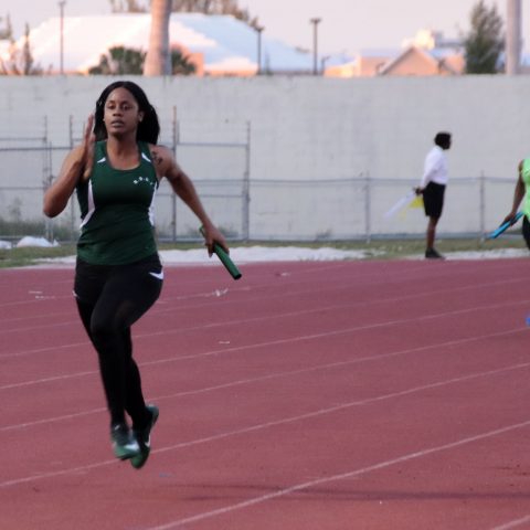Able Woman Marine Michelle Colebrooke running the final leg of the 4 x 100 meter relay at the Police Track Meet on April 4, 2018 at the Thomas A. Robinson Stadium. The Royal Bahamas Defence Force females placed first in that event.