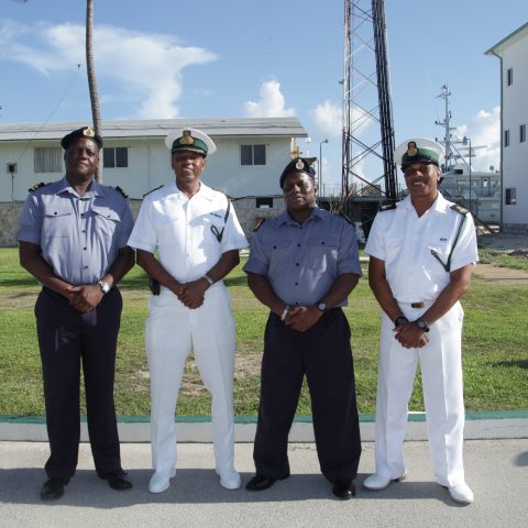 Chief Petty Officer Daniel Miller at HMBS Coral Harbour on August 27, 2018 on his retirement from the Royal Bahamas Defence Force.  From left: Senior Lieutenant Gordon Roberts, Acting Deputy Base Engineering Officer; Commander Michael Sweeting, the Base Executive Officer; Chief Petty Officer Miller; and Force Chief Petty Officer Dwight Baker, Engineering Administrator.