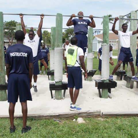 RBDF Personnel participating in the pull up exercise during the annual Base Fitness Test at the Defence Force Base.