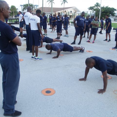 RBDF Personnel participating in the push-up exercise during the annual Base Fitness Test at the Defence Force Base.