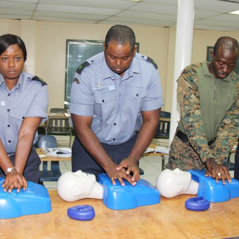 Course Participants in a simulation exercise during the American Heart Association First Aid and CPR Training at the Coral Harbour Base. From left: Leading Woman Marine Lashonna Williams, Able Seaman Theo Cochinamogulos and Aulbourn Knowles and Able Woman Marine Keisha Cooper.